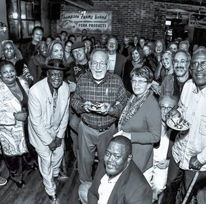 Collage of album covers featuring Howlin' Wolf and Muddy Waters.