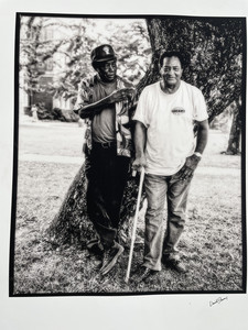 B.B. King kneeling and singing in a church interior during a performance.